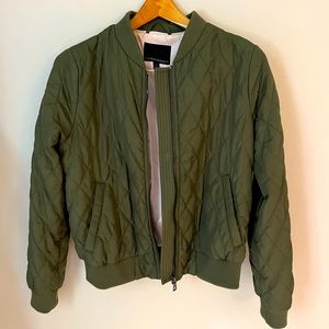 Green quilted bomber jacket